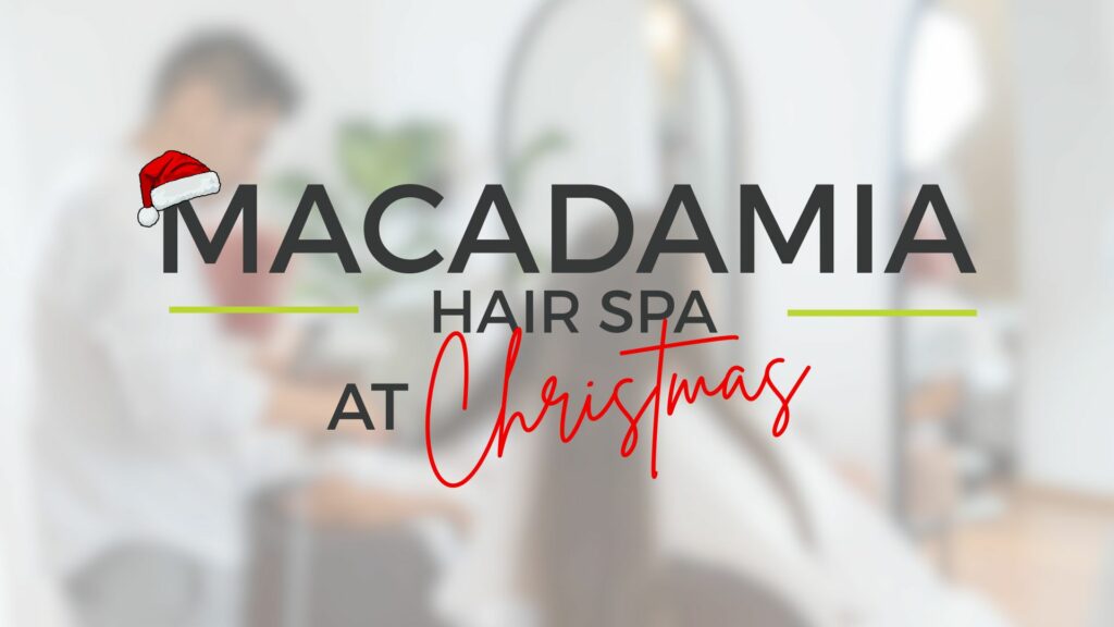 Macadamia Hair Spa at Christmas, featuring a Santa hat atop the M, highlights Festive Glam against a softly blurred salon backdrop—a delightful setting for your Christmas Week appointment.
